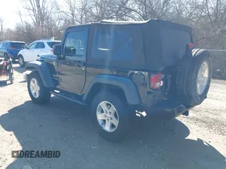 2014 Jeep Wrangler Sport with VIN 1C4AJWAGXEL319749, listed as a IAAI auction lot 41752779 with 140,045 mi miles and . Bid and sale history available at DreamBid. Image 3.
