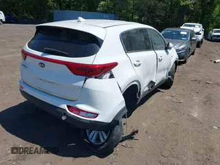 2018 Kia Sportage LX z VIN KNDPMCAC5J7372245, wystawiony jako IAAI lot #42227419 z przebiegiem 98 350 mil mil oraz . Historia ofert i sprzedaży dostępna na DreamBid. Obrazek 6.
