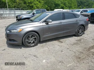 2014 Ford Fusion SE Hybrid with VIN 3FA6P0LU9ER289817, listed as a Copart auction lot 60909615 with 168,884 mi miles and Salvage title. Bid and sale history available at DreamBid. Image 1.