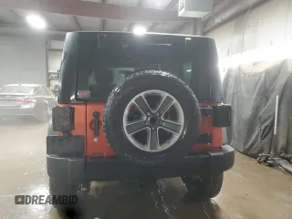 2009 Jeep Wrangler Rubicon with VIN 1J4GA64179L733136, listed as a Copart auction lot 43747805 with 94,899 mi miles and Salvage Title. Bid and sale history available at DreamBid. Image 6.