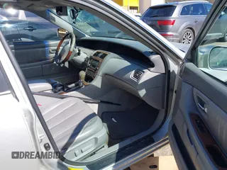 2004 Toyota Avalon XL z VIN 4T1BF28B64U340420, wystawiony jako IAAI lot #41753265 z przebiegiem 173 302 mil mil oraz . Historia ofert i sprzedaży dostępna na DreamBid. Obrazek 5.