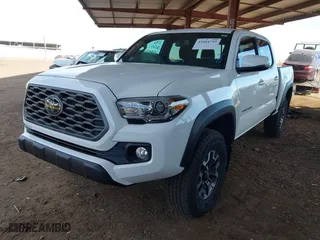 2023 Toyota Tacoma 4WD SR with VIN 3TMCZ5AN8PM650793, listed as a IAAI auction lot 41664712 with 9,427 mi miles. Bid and sale history available at carsss.com. Image 18.