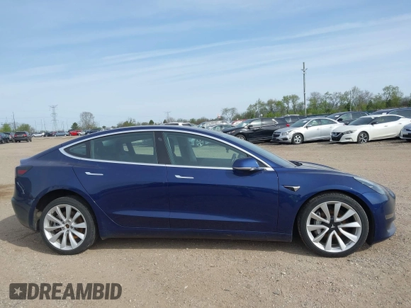 2018 Tesla Model 3 Long Range Battery z VIN 5YJ3E1EB7JF088224, wystawiony jako IAAI lot #42097665 z przebiegiem Nie podano mil oraz . Historia ofert i sprzedaży dostępna na DreamBid. Obrazek 12.