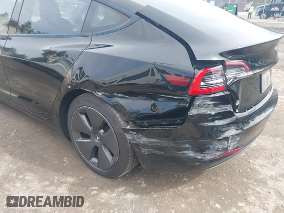 2022 Tesla Model 3 Long Range with VIN 5YJ3E1EBXNF177128, listed as a IAAI auction lot 41966089 with 75,140 mi miles and . Bid and sale history available at DreamBid. Image 6.