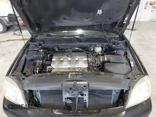2002 Cadillac DeVille DTS with VIN 1G6KF579X2U141648, listed as a IAAI auction lot 42059624 with 179,338 mi miles. Bid and sale history available at carsss.com. Image 10.