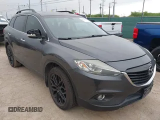2013 Mazda CX-9 Grand Touring with VIN JM3TB2DA1D0401785, listed as a IAAI auction lot 42034331 with 128,146 mi miles and . Bid and sale history available at DreamBid. Image 1.