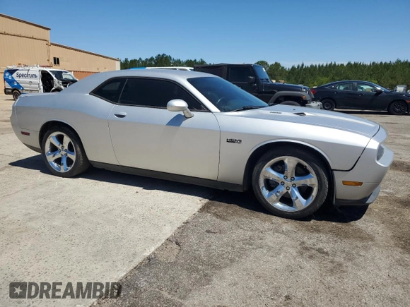 2012 Dodge Challenger R/T z VIN 2C3CDYBT0CH259731, wystawiony jako Copart lot #58033035 z przebiegiem 142 427 mil mil oraz Czysty tytuł • Clean title. Historia ofert i sprzedaży dostępna na DreamBid. Obrazek 4.