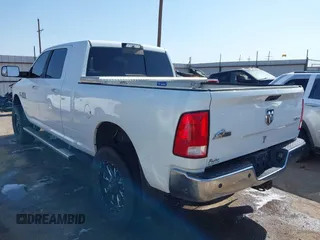 2015 Ram 2500 SLT with VIN 3C6UR5ML3FG674244, listed as a IAAI auction lot 42550144 with 220,481 mi miles and . Bid and sale history available at DreamBid. Image 3.