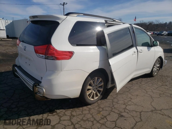 2013 Toyota Sienna XLE with VIN 5TDDK3DC2DS062598, listed as a Copart auction lot 50026545 with 130,719 mi miles and Salvage Title. Bid and sale history available at DreamBid. Image 3.