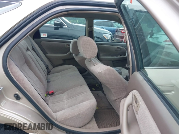 2000 Toyota Camry LE z VIN 4T1BF22K2YU094772, wystawiony jako IAAI lot #42427895 z przebiegiem 118 178 mil mil oraz . Historia ofert i sprzedaży dostępna na DreamBid. Obrazek 8.