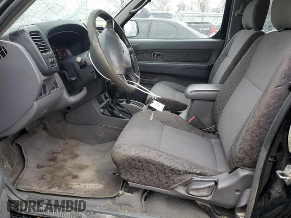 2001 Nissan Xterra XE z VIN 5N1ED28Y31C531253, wystawiony jako Copart lot #49736505 z przebiegiem 318 998 mil mil oraz Szkoda całkowita • Salvage title. Historia ofert i sprzedaży dostępna na DreamBid. Obrazek 7.
