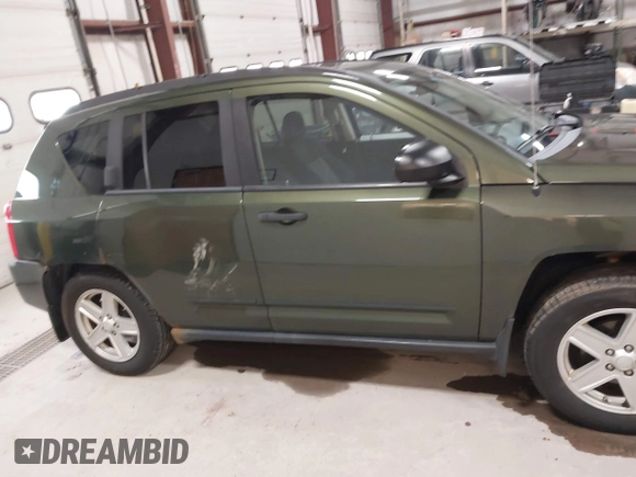 2008 Jeep Compass Sport with VIN 1J8FF47W28D534267, listed as a IAAI auction lot 42009243 with 122,720 mi miles and . Bid and sale history available at carsss.com. Image 13.