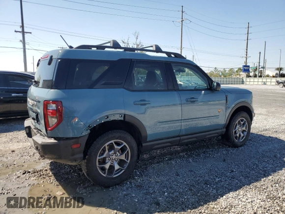 2023 Ford Bronco Sport Badlands z VIN 3FMCR9D9XPRE02582, wystawiony jako Copart lot #46403845 z przebiegiem 26 713 mil mil oraz Nie do naprawy • Non repairable. Historia ofert i sprzedaży dostępna na DreamBid. Obrazek 3.