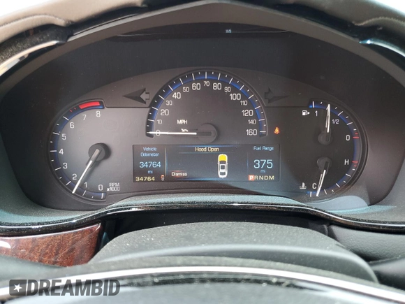 2015 Cadillac CTS Luxury RWD with VIN 1G6AR5SX2F0115311, listed as a Copart auction lot 58944915 with 34,764 mi miles and Salvage title. Bid and sale history available at DreamBid. Image 9.