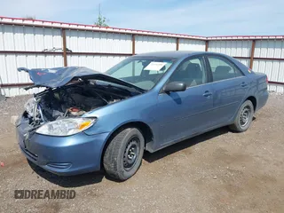 2004 Toyota Camry LE z VIN JTDBE32K140260522, wystawiony jako IAAI lot #42476400 z przebiegiem 152 466 mil mil oraz . Historia ofert i sprzedaży dostępna na DreamBid. Obrazek 2.