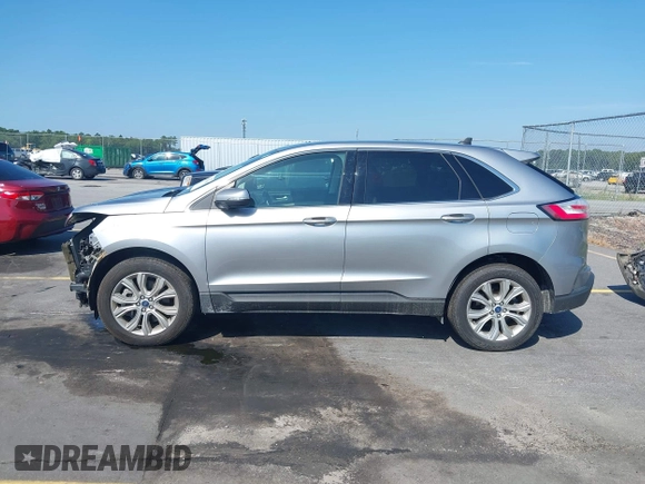 2021 Ford Edge Titanium with VIN 2FMPK3K97MBA15391, listed as a IAAI auction lot 42711656 with 40,723 mi miles and . Bid and sale history available at DreamBid. Image 15.