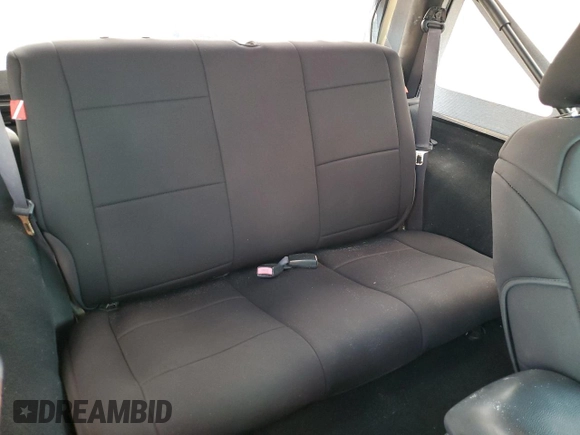 2014 Jeep Wrangler Sport with VIN 1C4AJWAG1EL200181, listed as a Copart auction lot 61165595 with 101,234 mi miles and Salvage title. Bid and sale history available at DreamBid. Image 11.