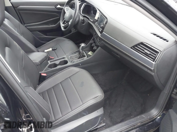 2023 Volkswagen Jetta SE with VIN 3VW7M7BUXPM038075, listed as a IAAI auction lot 42314234 with 19,490 mi miles and . Bid and sale history available at DreamBid. Image 5.