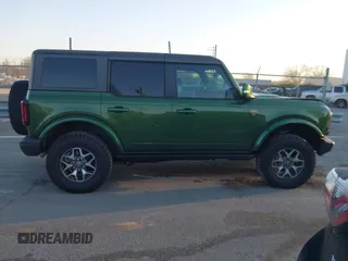 2023 Ford Bronco z VIN 1FMEE5DP2PLB43810, wystawiony jako IAAI lot #41656885 z przebiegiem 22 178 mil mil oraz . Historia ofert i sprzedaży dostępna na DreamBid. Obrazek 13.