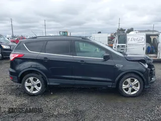 2015 Ford Escape SE with VIN 1FMCU9G98FUA26059, listed as a IAAI auction lot 41991222 with 149,298 mi miles and . Bid and sale history available at DreamBid. Image 14.