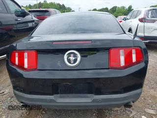 2012 Ford Mustang Premium with VIN 1ZVBP8AM4C5285696, listed as a IAAI auction lot 42465296 with 143,387 mi miles and . Bid and sale history available at DreamBid. Image 17.