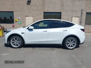 2023 Tesla Model Y Long Range with VIN 7SAYGDEE2PF696336, listed as a IAAI auction lot 41894686 with 34,203 mi miles. Bid and sale history available at carsss.com. Image 14.