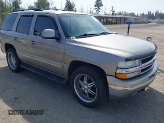 2001 Chevrolet Tahoe LS with VIN 1GNEK13T41J278818, listed as a IAAI auction lot 42125186 with 243,319 mi miles. Bid and sale history available at carsss.com. Image 1.