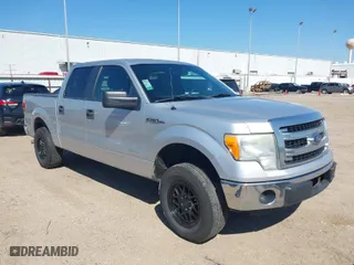 2013 Ford F-150 XL with VIN 1FTFW1CT2DFB23323, listed as a IAAI auction lot 41483856 with 272,488 mi miles. Bid and sale history available at carsss.com. Image 1.
