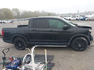 2019 Honda Ridgeline Black Edition with VIN 5FPYK3F87KB029017, listed as a IAAI auction lot 41876145 with 95,740 mi miles and . Bid and sale history available at DreamBid. Image 14.