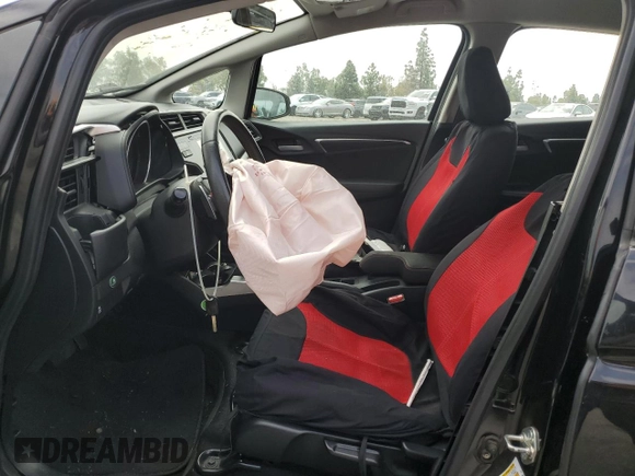 2018 Honda Fit Sport z VIN 3HGGK5H65JM702183, wystawiony jako Copart lot #55439775 z przebiegiem Nie podano mil oraz Szkoda całkowita • Salvage title. Historia ofert i sprzedaży dostępna na DreamBid. Obrazek 7.