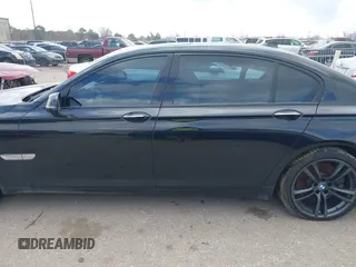 2013 BMW 7 Series 750Li with VIN WBAYE8C55DD133178, listed as a IAAI auction lot 41509860 with 90,841 mi miles and . Bid and sale history available at DreamBid. Image 14.