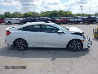 2018 Honda Civic Si with VIN 2HGFC1E53JH700251, listed as a IAAI auction lot 42043732 with 104,763 mi miles and . Bid and sale history available at DreamBid. Image 13.