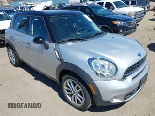 2015 MINI Countryman S z VIN WMWZC3C51FWT06084, wystawiony jako IAAI lot #41949558 z przebiegiem 102 657 mil mil oraz . Historia ofert i sprzedaży dostępna na DreamBid. Obrazek 1.