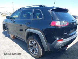 2019 Jeep Cherokee Trailhawk Elite with VIN 1C4PJMBX0KD198328, listed as a IAAI auction lot 42085194 with 76,312 mi miles and . Bid and sale history available at DreamBid. Image 3.