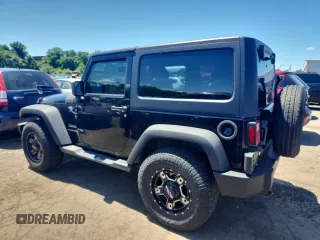 2013 Jeep Wrangler Sport with VIN 1C4AJWAG8DL693145, listed as a Copart auction lot 65591835 with 93,313 mi miles and Salvage title. Bid and sale history available at DreamBid. Image 2.