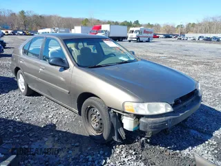 2000 Nissan Altima XE with VIN 1N4DL01D0YC181174, listed as a IAAI auction lot 41798721 with 119,682 mi miles. Bid and sale history available at carsss.com. Image 1.