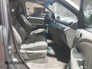 2007 Honda Odyssey EX-L with VIN 5FNRL38697B012944, listed as a IAAI auction lot 42144250 with 234,016 mi miles and . Bid and sale history available at DreamBid. Image 5.