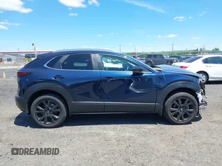 2024 Mazda CX-30 S Select Sport with VIN 3MVDMBBM2RM657781, listed as a IAAI auction lot 42297311 with 13,677 mi miles and . Bid and sale history available at DreamBid. Image 13.