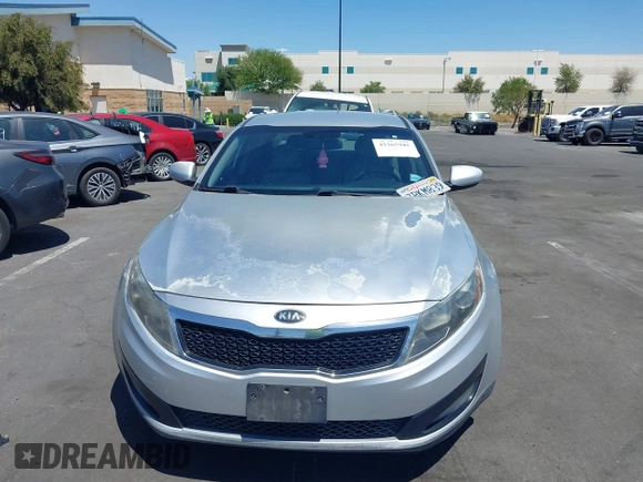 2013 Kia Optima LX z VIN KNAGM4A7XD5389662, wystawiony jako IAAI lot #42265945 z przebiegiem 164 488 mil mil oraz . Historia ofert i sprzedaży dostępna na DreamBid. Obrazek 12.