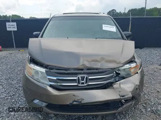 2011 Honda Odyssey Touring с VIN 5FNRL5H98BB095796, выставлен на аукционе IAAI как лот 42094695 с пробегом 158 410 миль миль и . История ставок и продаж доступна на DreamBid. Изображение 13.