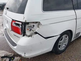 2007 Honda Odyssey EX-L z VIN 5FNRL38737B072789, wystawiony jako IAAI lot #41203148 z przebiegiem 156 828 mil mil oraz . Historia ofert i sprzedaży dostępna na DreamBid. Obrazek 17.