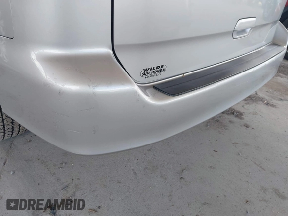 2003 Honda Odyssey EX-L z VIN 5FNRL18933B087714, wystawiony jako IAAI lot #42510813 z przebiegiem 145 360 mil mil oraz . Historia ofert i sprzedaży dostępna na DreamBid. Obrazek 6.