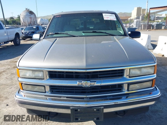 1999 Chevrolet Tahoe Z71 with VIN 1GNEK13R7XJ521373, listed as a IAAI auction lot 42131893 with 250,712 mi miles and . Bid and sale history available at DreamBid. Image 6.