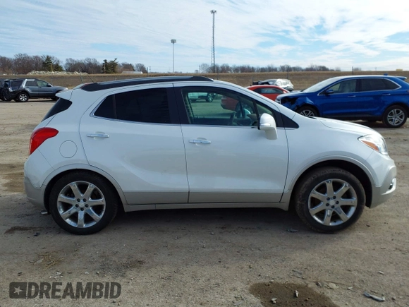 2016 Buick Encore Premium with VIN KL4CJDSB3GB607132, listed as a IAAI auction lot 41526249 with 50,617 mi miles and . Bid and sale history available at carsss.com. Image 13.