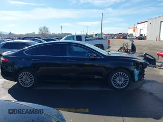 2016 Ford Fusion Titanium with VIN 3FA6P0K9XGR152837, listed as a IAAI auction lot 41647436 with 196,700 mi miles. Bid and sale history available at carsss.com. Image 13.