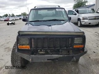 2000 Jeep Cherokee with VIN 1J4FF48S7YL209729, listed as a Copart auction lot 53647685 with 268,552 mi miles and Salvage title. Bid and sale history available at DreamBid. Image 5.