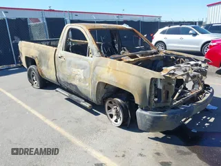2014 Chevrolet Silverado 1500 Work Truck with VIN 1GCNCPEH0EZ272958, listed as a IAAI auction lot 41801400 with 130,363 mi miles and . Bid and sale history available at DreamBid. Image 1.