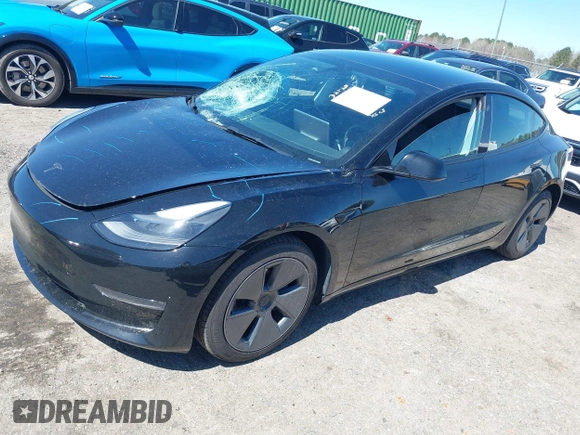 2022 Tesla Model 3 Long Range with VIN 5YJ3E1EB3NF104313, listed as a IAAI auction lot 41832803 with 39,061 mi miles and . Bid and sale history available at DreamBid. Image 19.