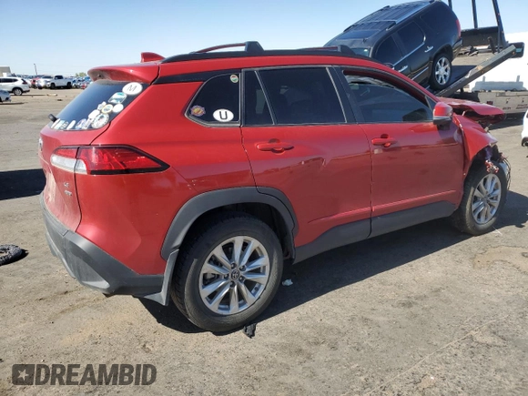 2022 Toyota Corolla Cross LE with VIN 7MUCAABG8NV008867, listed as a Copart auction lot 57232415 with 48,670 mi miles and Salvage title. Bid and sale history available at DreamBid. Image 3.