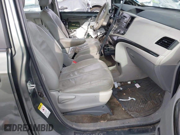 2014 Toyota Sienna L with VIN 5TDZK3DC2ES429684, listed as a IAAI auction lot 41529309 with 112,190 mi miles. Bid and sale history available at carsss.com. Image 5.